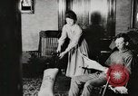Standbild motorisierte Waschmaschine Staubsauger und Spinning Wheel United States USA, 1920, aus Sekunde 35 historischem Filmmaterial Videoclip 65675025347