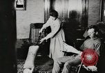 Standbild motorisierte Waschmaschine Staubsauger und Spinning Wheel United States USA, 1920, aus Sekunde 37 historischem Filmmaterial Videoclip 65675025347