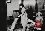 Standbild motorisierte Waschmaschine Staubsauger und Spinning Wheel United States USA, 1920, aus Sekunde 38 historischem Filmmaterial Videoclip 65675025347