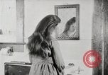 Standbild motorisierte Waschmaschine Staubsauger und Spinning Wheel United States USA, 1920, aus Sekunde 40 historischem Filmmaterial Videoclip 65675025347