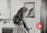 Standbild motorisierte Waschmaschine Staubsauger und Spinning Wheel United States USA, 1920, aus Sekunde 41 historischem Filmmaterial Videoclip 65675025347
