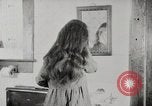Standbild motorisierte Waschmaschine Staubsauger und Spinning Wheel United States USA, 1920, aus Sekunde 50 historischem Filmmaterial Videoclip 65675025347