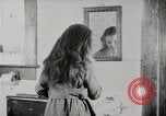 Standbild motorisierte Waschmaschine Staubsauger und Spinning Wheel United States USA, 1920, aus Sekunde 51 historischem Filmmaterial Videoclip 65675025347