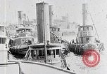 Image of New York Harbor and Brooklyn Bridge seen from steamship New York City USA, 1917, second 3 stock footage video 65675025400