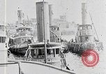 Image of New York Harbor and Brooklyn Bridge seen from steamship New York City USA, 1917, second 4 stock footage video 65675025400