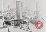 Image of New York Harbor and Brooklyn Bridge seen from steamship New York City USA, 1917, second 5 stock footage video 65675025400