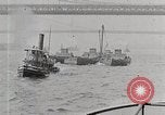 Image of New York Harbor and Brooklyn Bridge seen from steamship New York City USA, 1917, second 20 stock footage video 65675025400