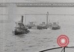 Image of New York Harbor and Brooklyn Bridge seen from steamship New York City USA, 1917, second 21 stock footage video 65675025400