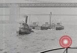 Image of New York Harbor and Brooklyn Bridge seen from steamship New York City USA, 1917, second 22 stock footage video 65675025400