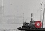 Image of New York Harbor and Brooklyn Bridge seen from steamship New York City USA, 1917, second 38 stock footage video 65675025400