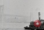 Image of New York Harbor and Brooklyn Bridge seen from steamship New York City USA, 1917, second 39 stock footage video 65675025400