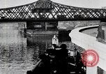 Image of New York Harbor and Brooklyn Bridge seen from steamship New York City USA, 1917, second 41 stock footage video 65675025400
