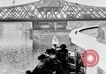 Image of New York Harbor and Brooklyn Bridge seen from steamship New York City USA, 1917, second 44 stock footage video 65675025400