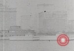 Image of New York Harbor and Brooklyn Bridge seen from steamship New York City USA, 1917, second 54 stock footage video 65675025400