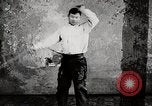 Standbild Will Rogers führt auf der Bühne United States USA, 1919, aus Sekunde 17 historischem Filmmaterial Videoclip 65675025421