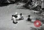 Image of Baptism Ceremony Montgomery Alabama USA, 1934, second 30 stock footage video 65675025446