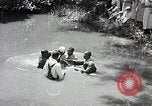 Image of Baptism Ceremony Montgomery Alabama USA, 1934, second 32 stock footage video 65675025446