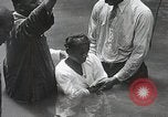 Image of Baptism Ceremony Montgomery Alabama USA, 1934, second 36 stock footage video 65675025446