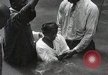 Image of Baptism Ceremony Montgomery Alabama USA, 1934, second 37 stock footage video 65675025446