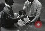 Image of Baptism Ceremony Montgomery Alabama USA, 1934, second 38 stock footage video 65675025446