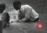 Image of Baptism Ceremony Montgomery Alabama USA, 1934, second 39 stock footage video 65675025446