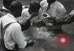 Image of Baptism Ceremony Montgomery Alabama USA, 1934, second 40 stock footage video 65675025446