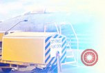 Image of Airman paints F100D plane Phu Cat Vietnam, 1968, second 1 stock footage video 65675025448