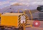 Image of Airman paints F100D plane Phu Cat Vietnam, 1968, second 3 stock footage video 65675025448