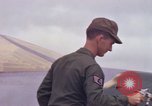 Image of Airman paints F100D plane Phu Cat Vietnam, 1968, second 34 stock footage video 65675025448