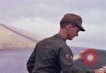 Image of Airman paints F100D plane Phu Cat Vietnam, 1968, second 36 stock footage video 65675025448