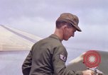 Image of Airman paints F100D plane Phu Cat Vietnam, 1968, second 39 stock footage video 65675025448