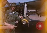 Image of United States Air Force airmen fuse 500 lb GP bombs Phu Cat Vietnam, 1968, second 3 stock footage video 65675025450