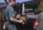 Image of United States Air Force airmen fuse 500 lb GP bombs Phu Cat Vietnam, 1968, second 5 stock footage video 65675025450