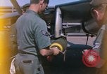 Image of United States Air Force airmen fuse 500 lb GP bombs Phu Cat Vietnam, 1968, second 6 stock footage video 65675025450