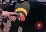 Image of United States Air Force airmen fuse 500 lb GP bombs Phu Cat Vietnam, 1968, second 10 stock footage video 65675025450