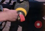 Image of United States Air Force airmen fuse 500 lb GP bombs Phu Cat Vietnam, 1968, second 11 stock footage video 65675025450