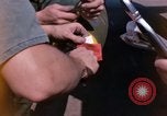Image of United States Air Force airmen fuse 500 lb GP bombs Phu Cat Vietnam, 1968, second 16 stock footage video 65675025450