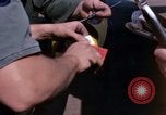Image of United States Air Force airmen fuse 500 lb GP bombs Phu Cat Vietnam, 1968, second 18 stock footage video 65675025450
