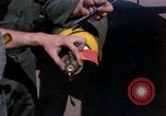 Image of United States Air Force airmen fuse 500 lb GP bombs Phu Cat Vietnam, 1968, second 21 stock footage video 65675025450