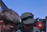 Image of United States Air Force airmen fuse 500 lb GP bombs Phu Cat Vietnam, 1968, second 26 stock footage video 65675025450