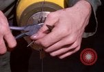 Image of United States Air Force airmen fuse 500 lb GP bombs Phu Cat Vietnam, 1968, second 38 stock footage video 65675025450