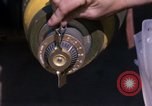 Image of United States Air Force airmen fuse 500 lb GP bombs Phu Cat Vietnam, 1968, second 42 stock footage video 65675025450