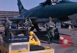 Image of United States Air Force airmen fuse 500 lb GP bombs Phu Cat Vietnam, 1968, second 48 stock footage video 65675025450
