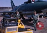 Image of United States Air Force airmen fuse 500 lb GP bombs Phu Cat Vietnam, 1968, second 49 stock footage video 65675025450