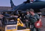 Image of United States Air Force airmen fuse 500 lb GP bombs Phu Cat Vietnam, 1968, second 51 stock footage video 65675025450