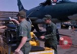 Image of United States Air Force airmen fuse 500 lb GP bombs Phu Cat Vietnam, 1968, second 52 stock footage video 65675025450