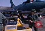 Image of United States Air Force airmen fuse 500 lb GP bombs Phu Cat Vietnam, 1968, second 55 stock footage video 65675025450