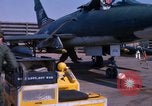 Image of United States Air Force airmen fuse 500 lb GP bombs Phu Cat Vietnam, 1968, second 58 stock footage video 65675025450