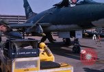 Image of United States Air Force airmen fuse 500 lb GP bombs Phu Cat Vietnam, 1968, second 59 stock footage video 65675025450