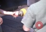 Image of United States Air Force airmen fuse 500 lb GP bombs Phu Cat Vietnam, 1968, second 60 stock footage video 65675025450